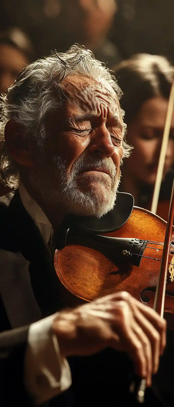 Aging violinist playing an emotional final concert on stage