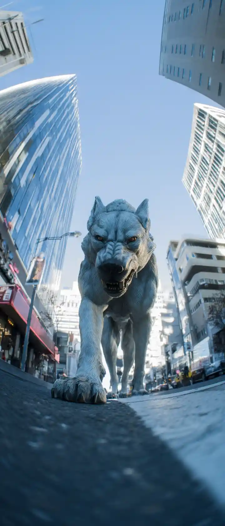 Cerberus towering above a modern city from low angle