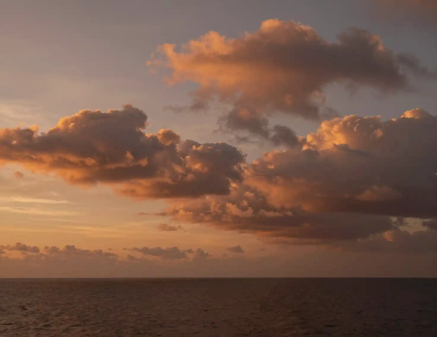 Serene sunset clouds drifting across the autumn sky