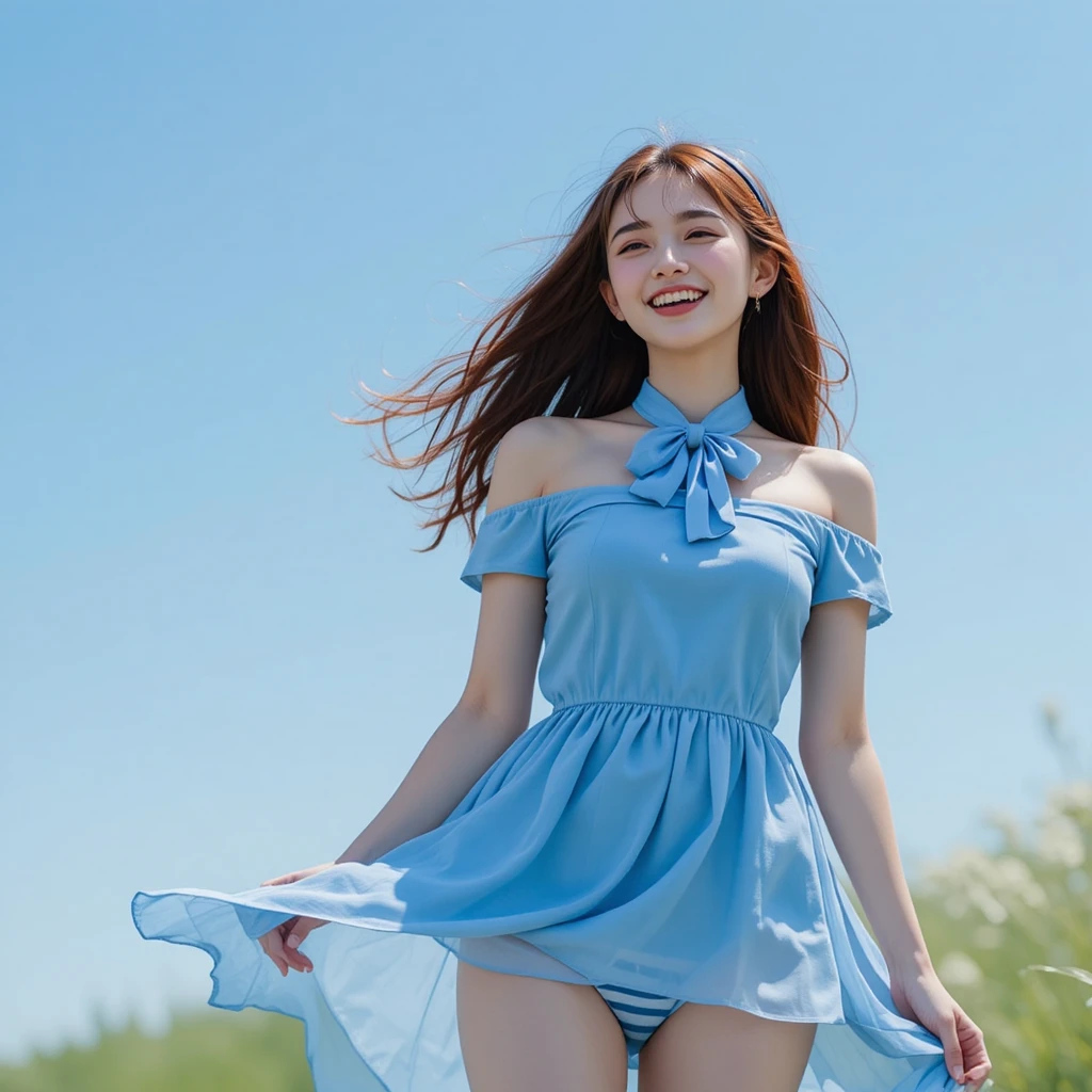 Laughing Korean girl in blue dress on sunny hillside