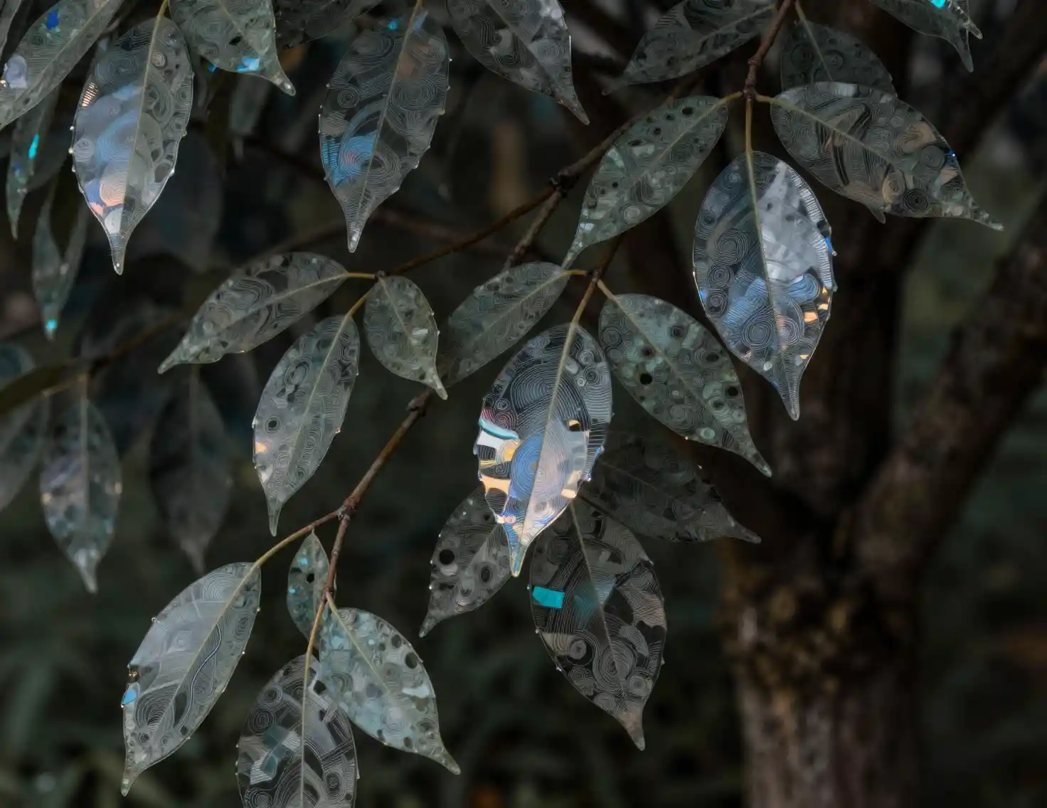 Macro view of a glass leaf tree with hidden imp
