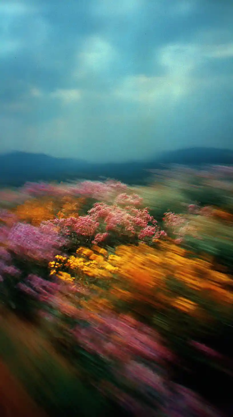Surreal cinematic landscape dissolving into dreamy motion blur