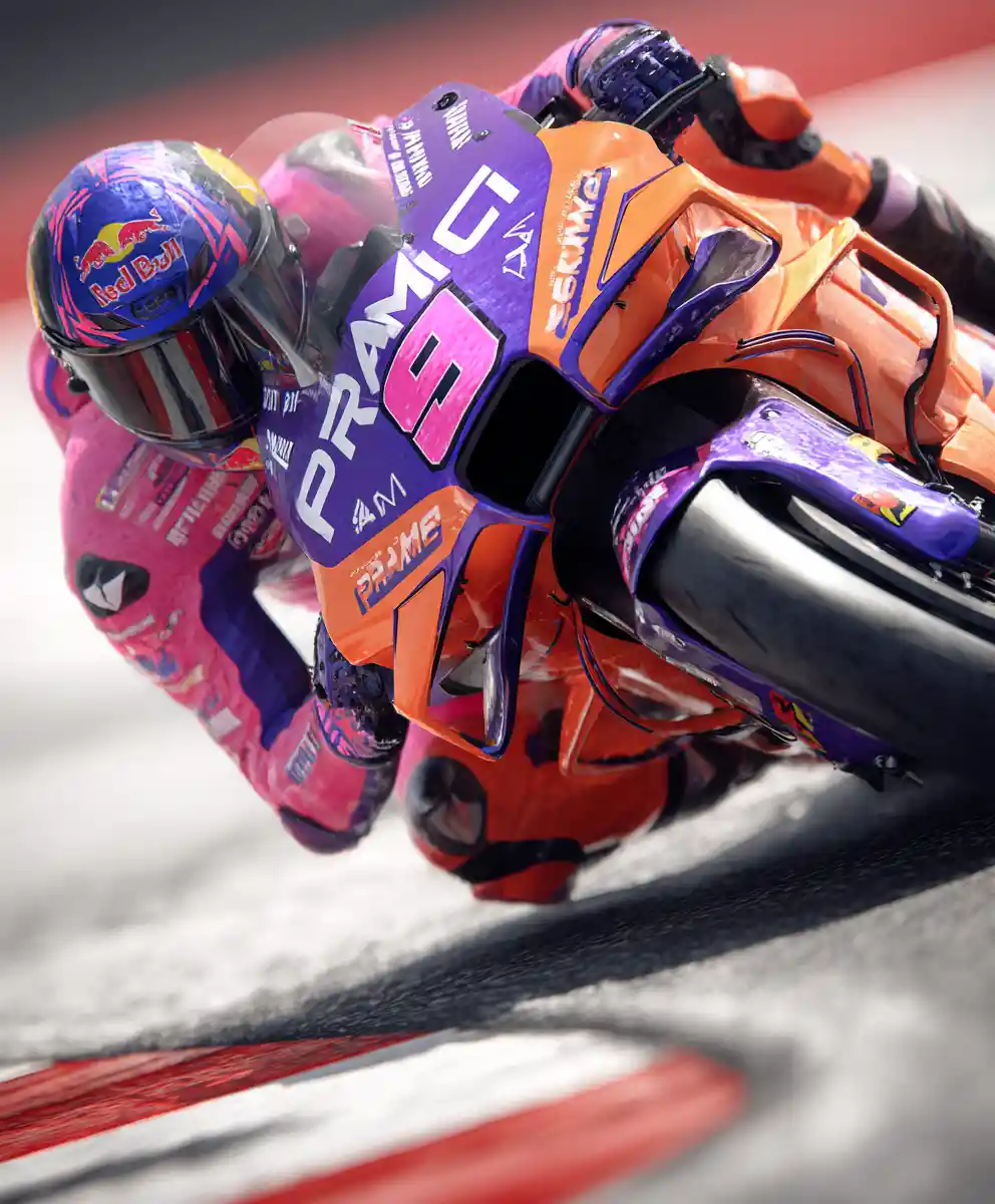 MotoGP rider leaning into corner on modern race bike
