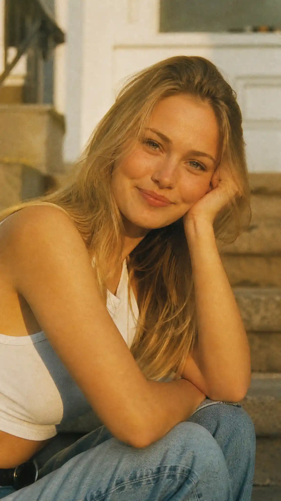 Nostalgic film portrait of a young blonde girl