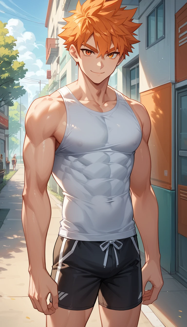 Homme grand et musclé en streetwear sportif au coucher du soleil