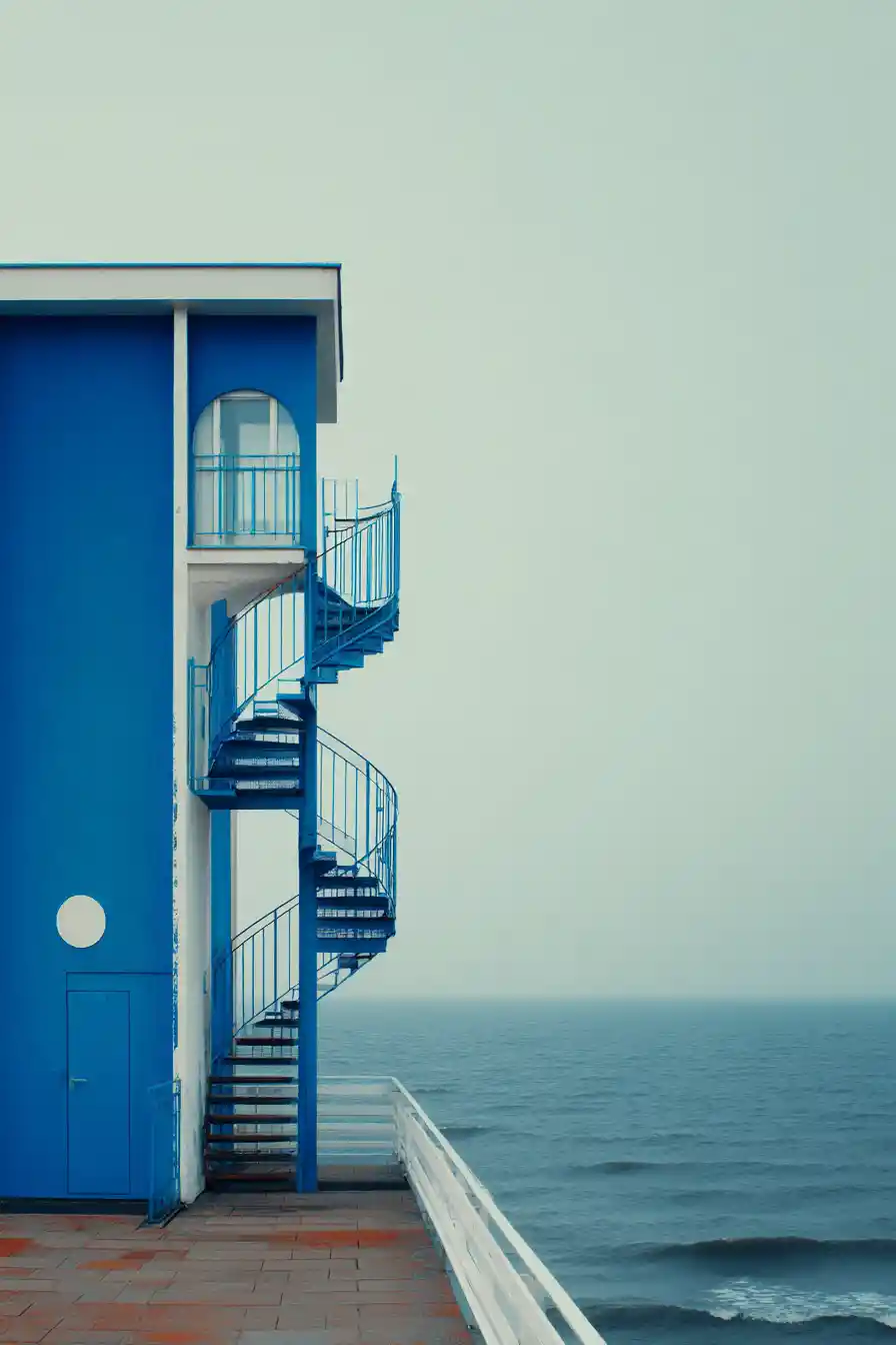 Surreal blue seaside with alien architecture in soft fog