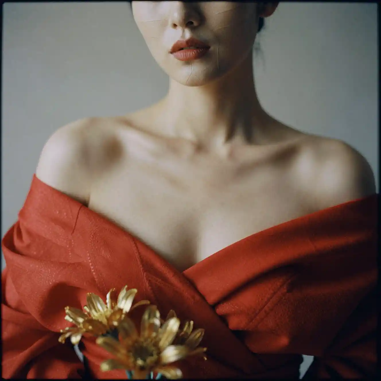 Minimalist portrait of a chic woman in red couture